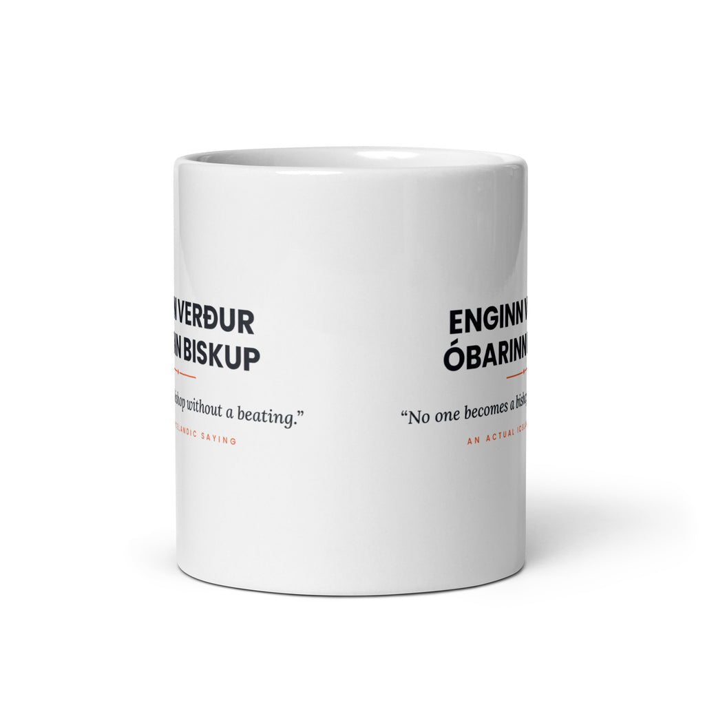 View opposite the handle of the white 11 oz Enginn verður óbarinn biskup mug, showing the gap between the two repeats of the design.