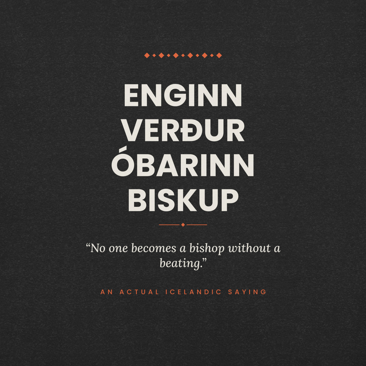 Close-up of the Enginn verður óbarinn biskup front print, showing cream lettering, English translation and coral accents on Black Heather fabric.