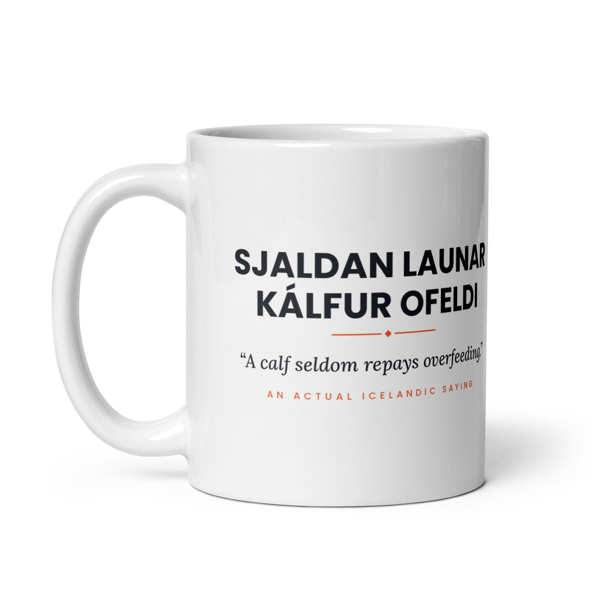 White 11 oz Sjaldan launar kálfur ofeldi mug, handle on the left, showing the repeated saying on the other side.