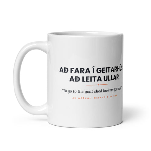White 11 oz Að fara í geitarhús að leita ullar mug, handle on the left, showing the repeated saying on the other side.