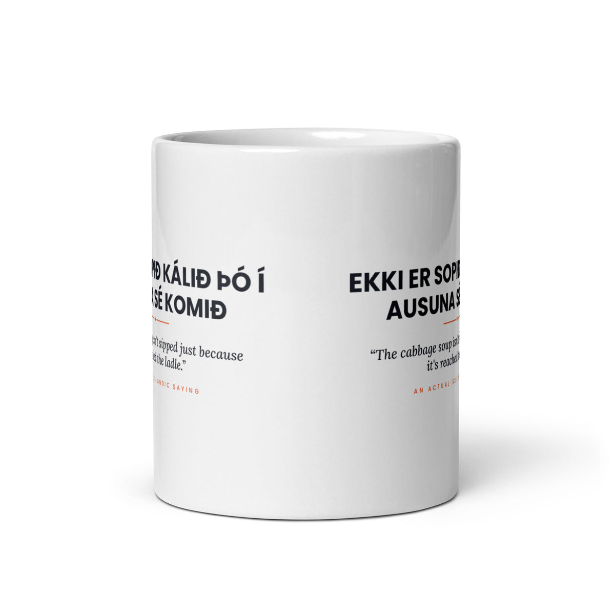 View opposite the handle of the white 11 oz Ekki er sopið kálið þó í ausuna sé komið mug, showing the gap between the two repeats of the design.