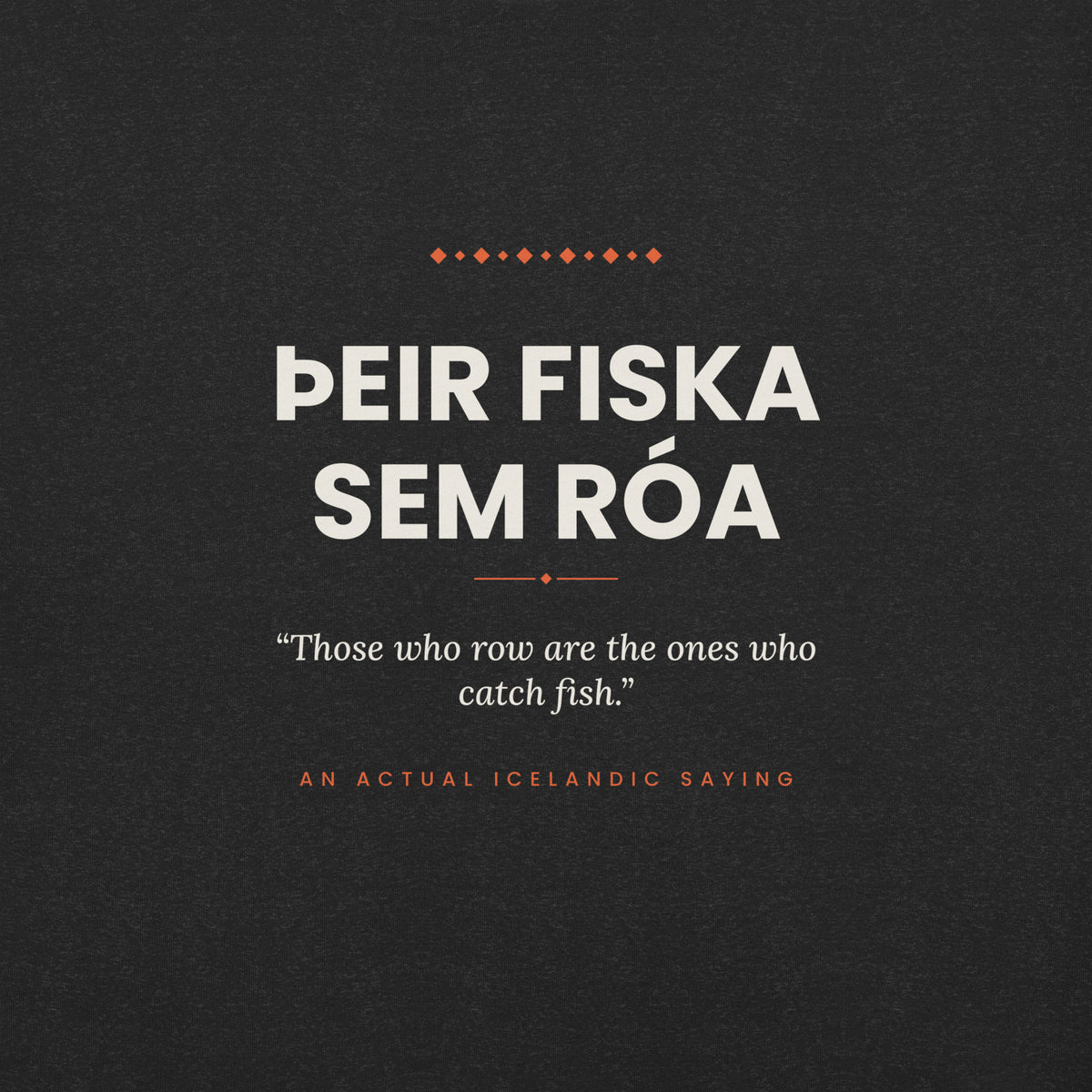 Close-up of the Þeir fiska sem róa front print, showing cream lettering, English translation and coral accents on Black Heather fabric.
