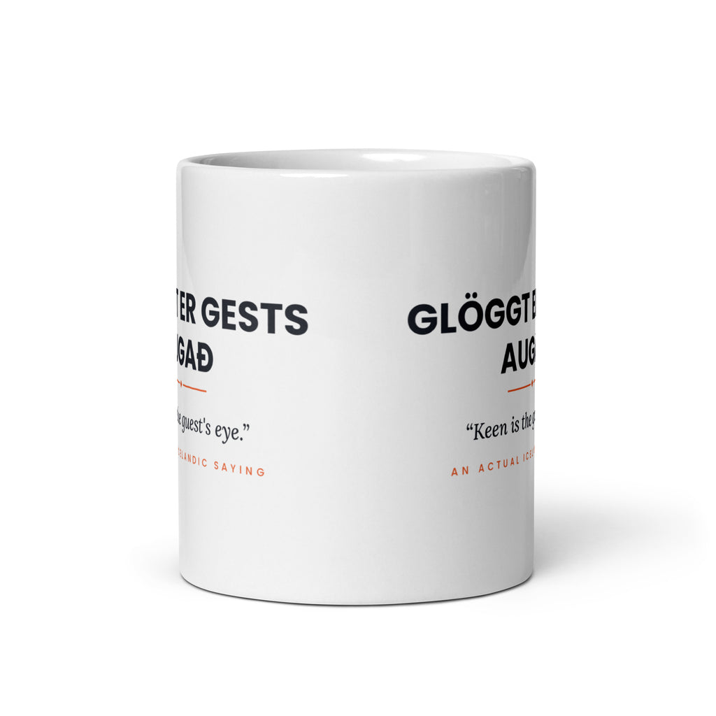 View opposite the handle of the white 11 oz Glöggt er gests augað mug, showing the gap between the two repeats of the design.