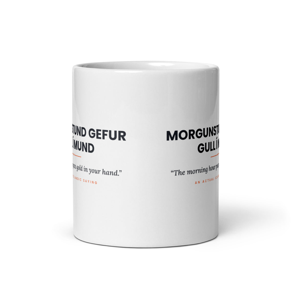 View opposite the handle of the white 11 oz Morgunstund gefur gull í mund mug, showing the gap between the two repeats of the design.
