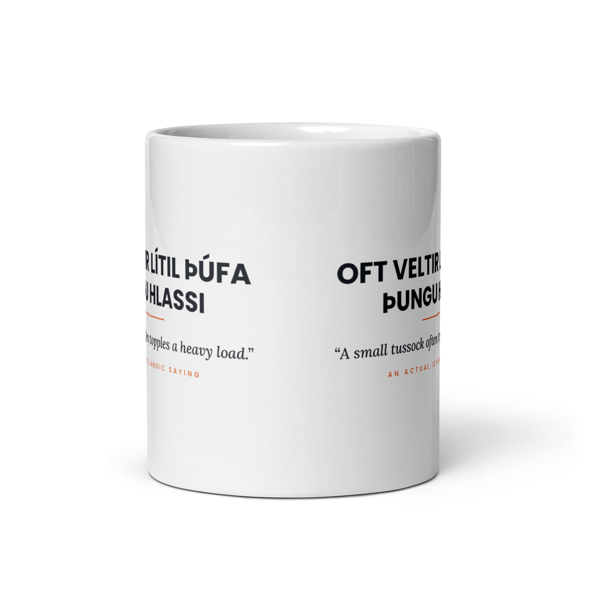 View opposite the handle of the white 11 oz Oft veltir lítil þúfa þungu hlassi mug, showing the gap between the two repeats of the design.