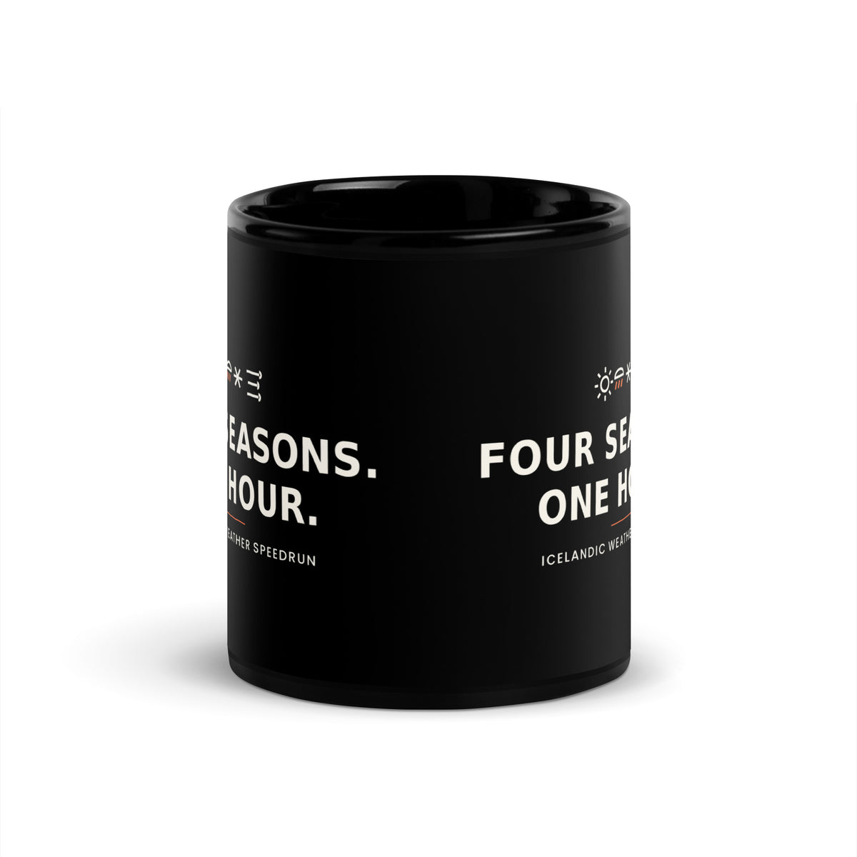 Black 11 oz Four Seasons. One Hour. mug, viewed opposite the handle, showing the gap between the repeated slogans.