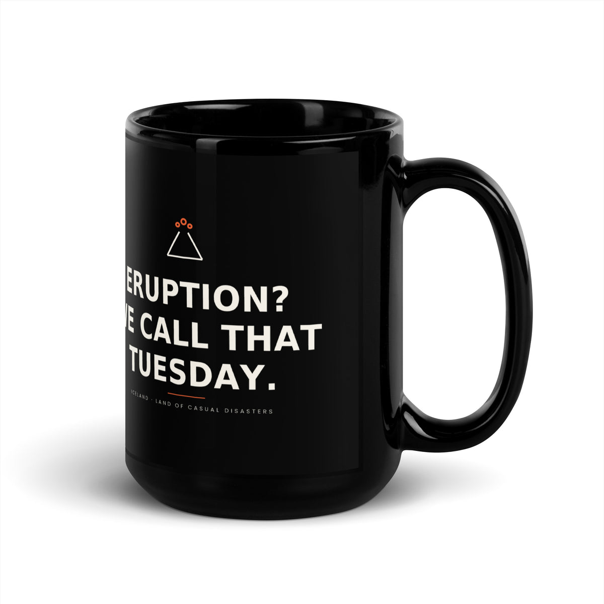 Black 15 oz Eruption? We Call That Tuesday. mug, handle on the right, showing the printed slogan.