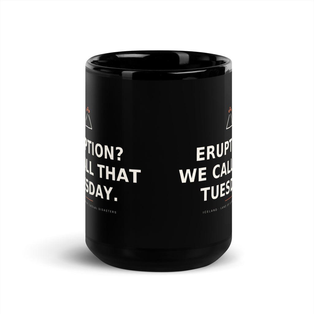 Black 15 oz Eruption? We Call That Tuesday. mug, viewed opposite the handle, showing the gap between the repeated slogans.