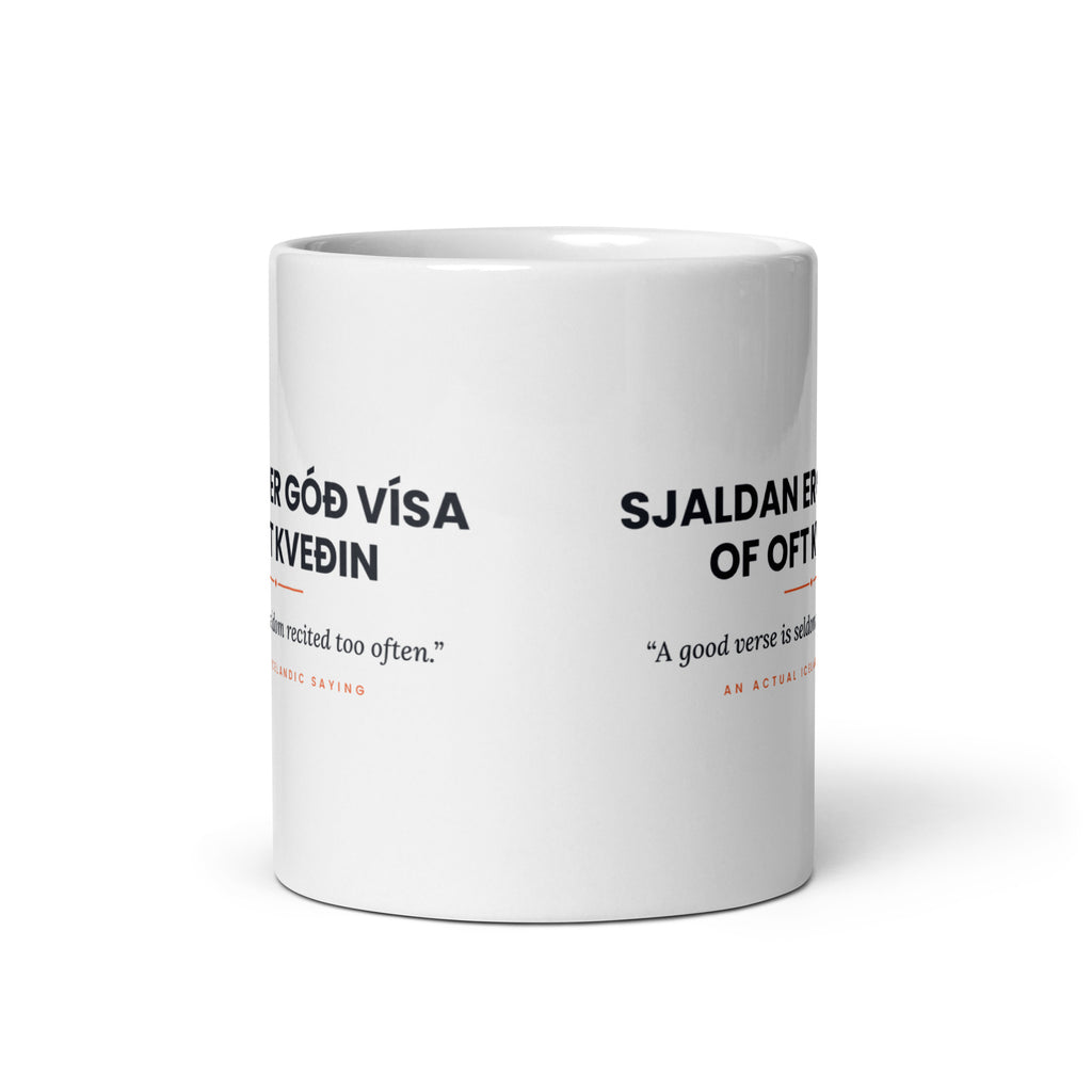 View opposite the handle of the white 11 oz Sjaldan er góð vísa of oft kveðin mug, showing the gap between the two repeats of the design.
