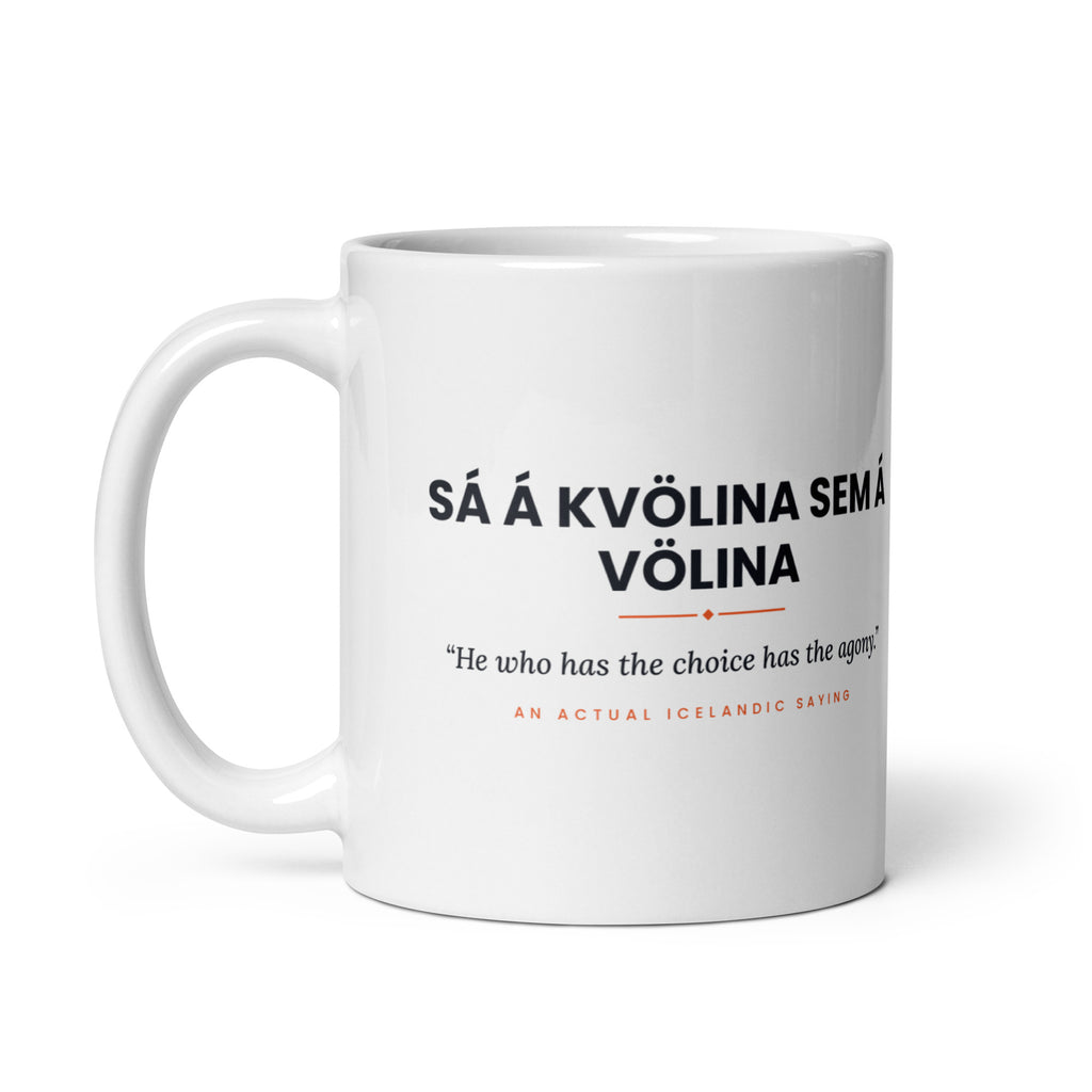 White 11 oz Sá á kvölina sem á völina mug, handle on the left, showing the repeated saying on the other side.