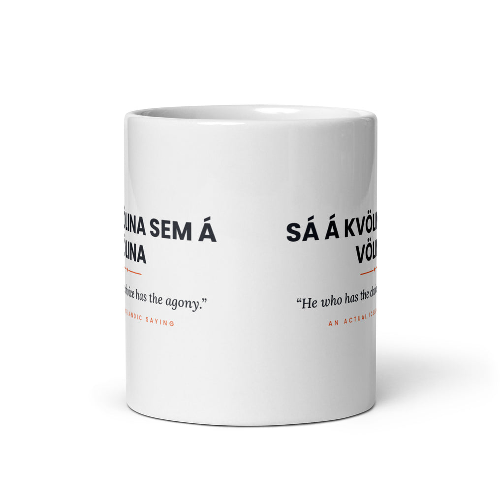 View opposite the handle of the white 11 oz Sá á kvölina sem á völina mug, showing the gap between the two repeats of the design.