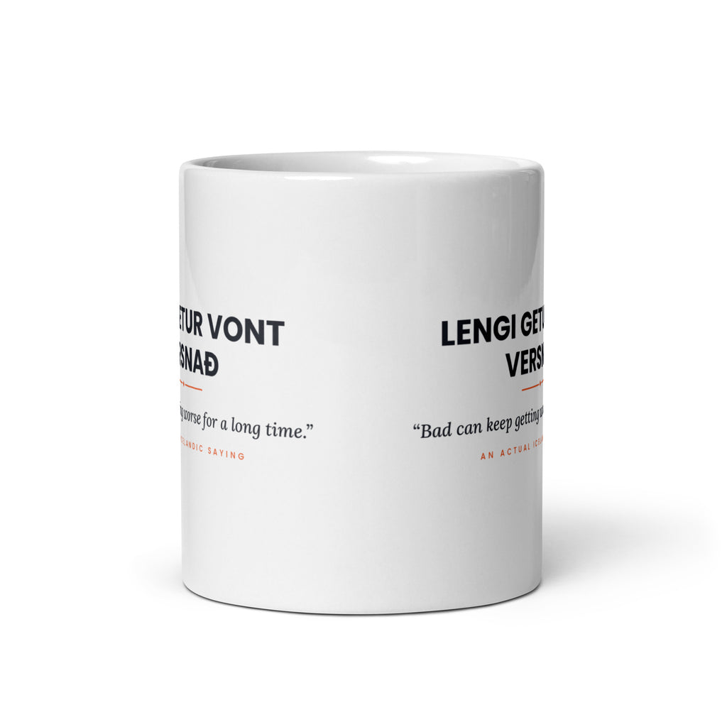 View opposite the handle of the white 11 oz Lengi getur vont versnað mug, showing the gap between the two repeats of the design.