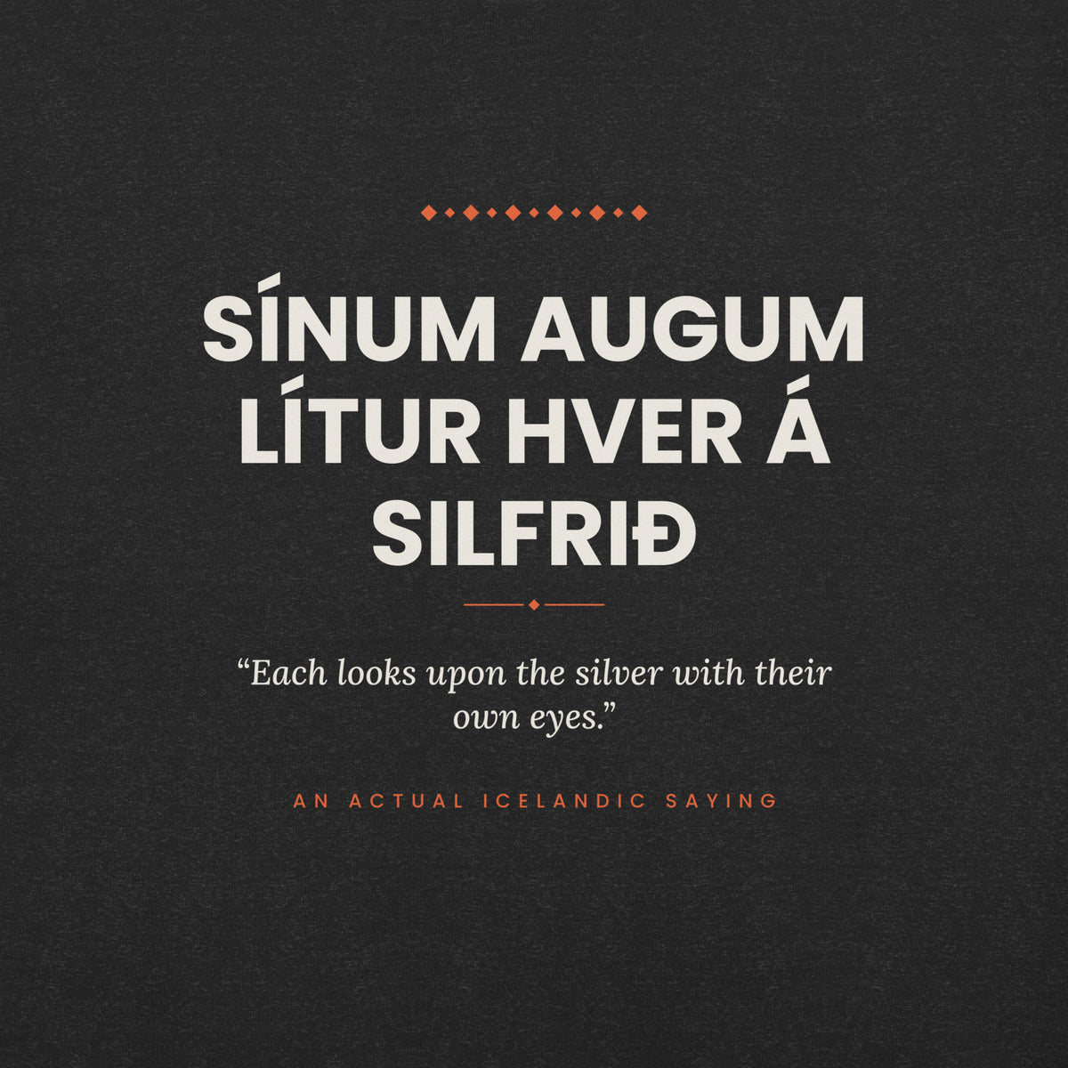 Close-up of the Sínum augum lítur hver á silfrið front print, showing cream lettering, English translation and coral accents on Black Heather fabric.