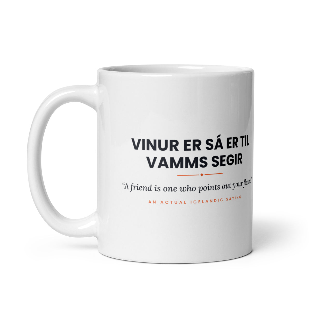 White 11 oz Vinur er sá er til vamms segir mug, handle on the left, showing the repeated saying on the other side.
