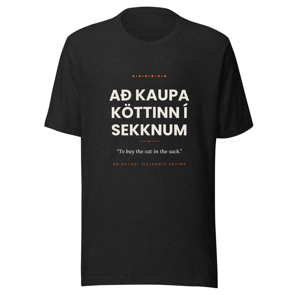 Front view of the Black Heather Að kaupa köttinn í sekknum tee, with cream lettering, English translation and coral accents.
